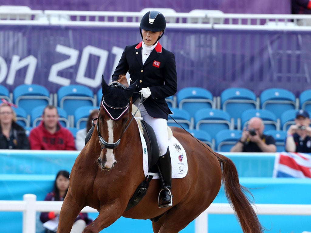 Sophie Wells and Pinocchio compete at Greenwich Park yesterday