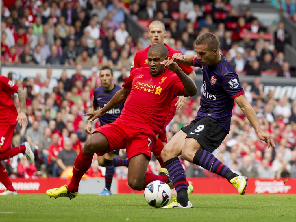 Lukas Podolski scores the first