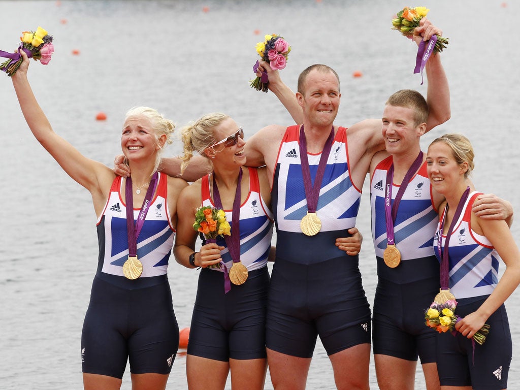 Great Britain's (from left) Pam Relph, Naomi Riches, David Smith, James Roe and Lily van den Broecke (cox) celebrate their victory in the mixed coxed fours yesterday