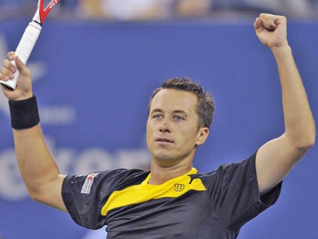 Philipp Kohlschreiber celebrates his marathon victory