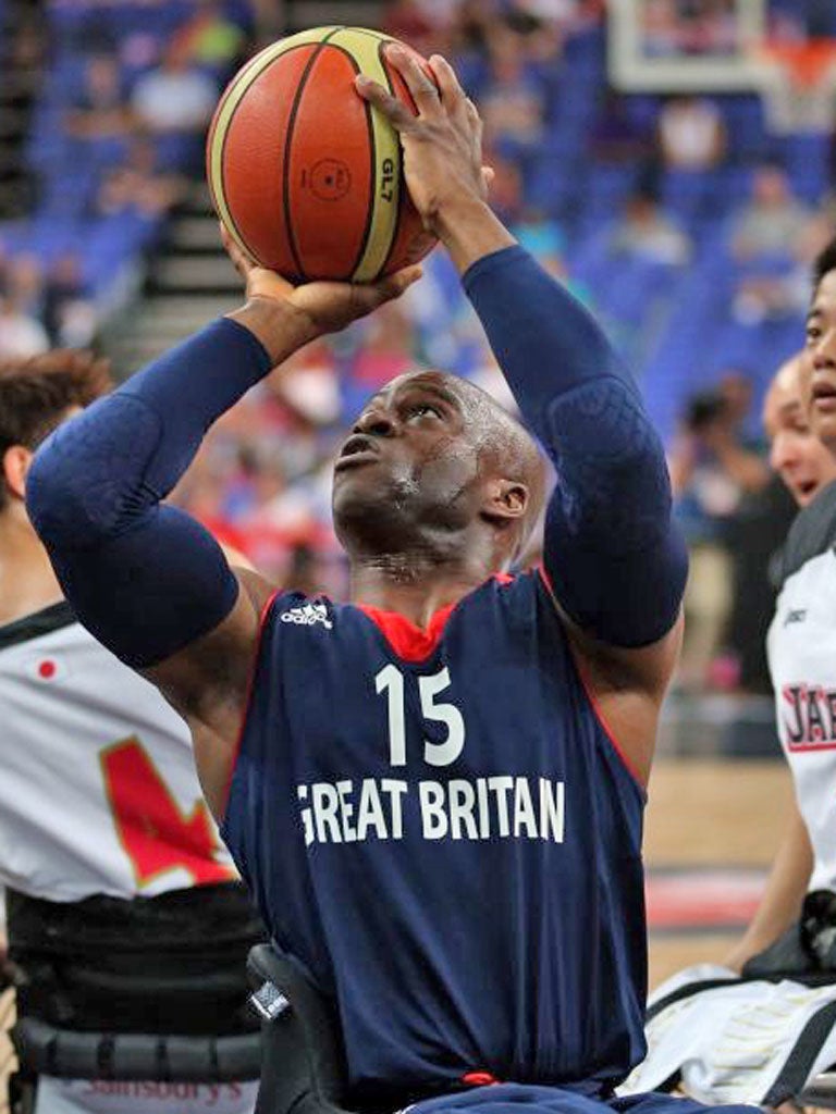 Ade Orogemi lines up a shot during the win over Japan