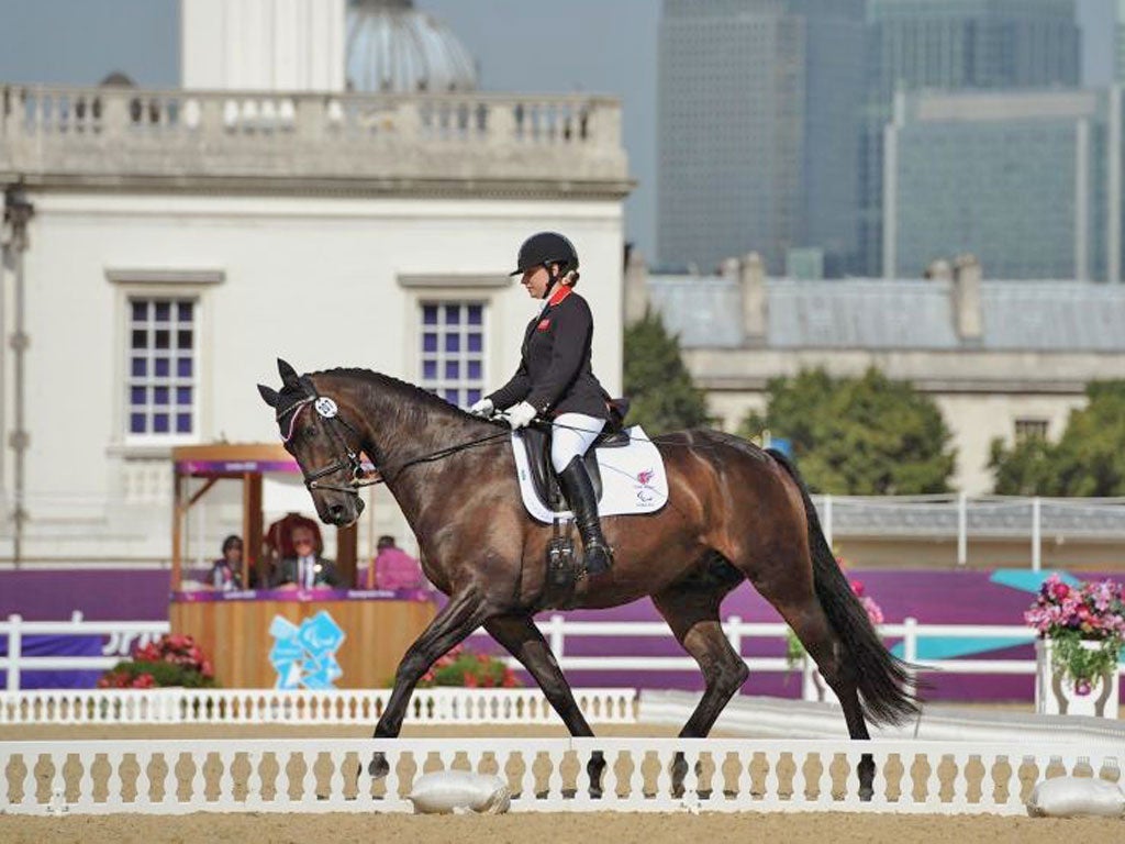 Natasha Baker on her way to winning gold at Greenwich Park