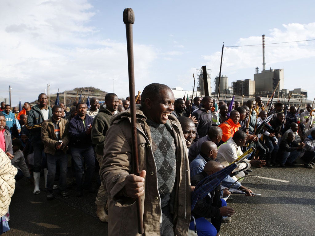 Miners welcome co-workers released from jail yesterday