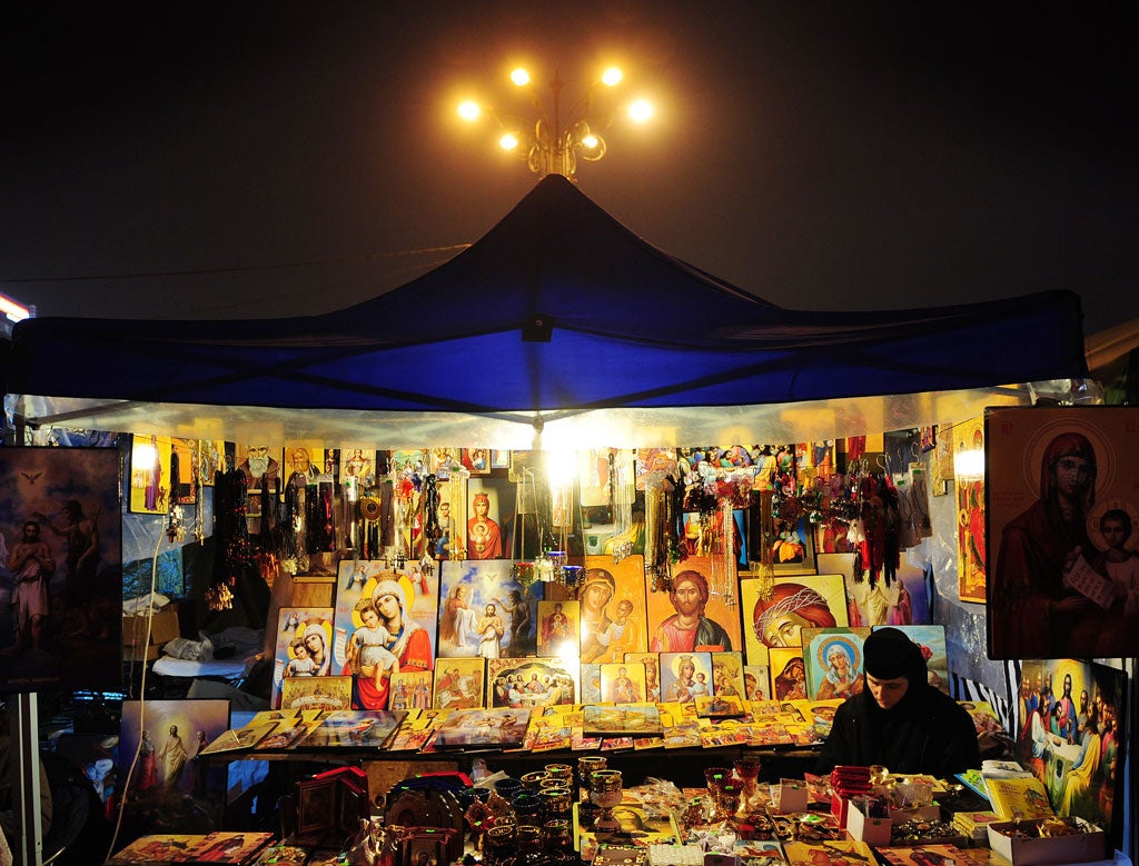 Help for erring humankind, but why pick one creed? A nun selling religious artifacts in Thessaloniki