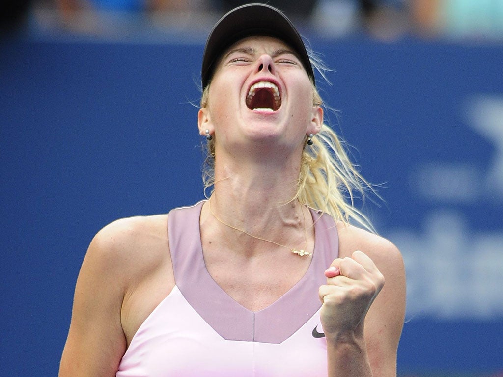 Come on: Maria Sharapova tries to will herself to victory in the semi-final, but despite defeat she was overall pleased with her year's work