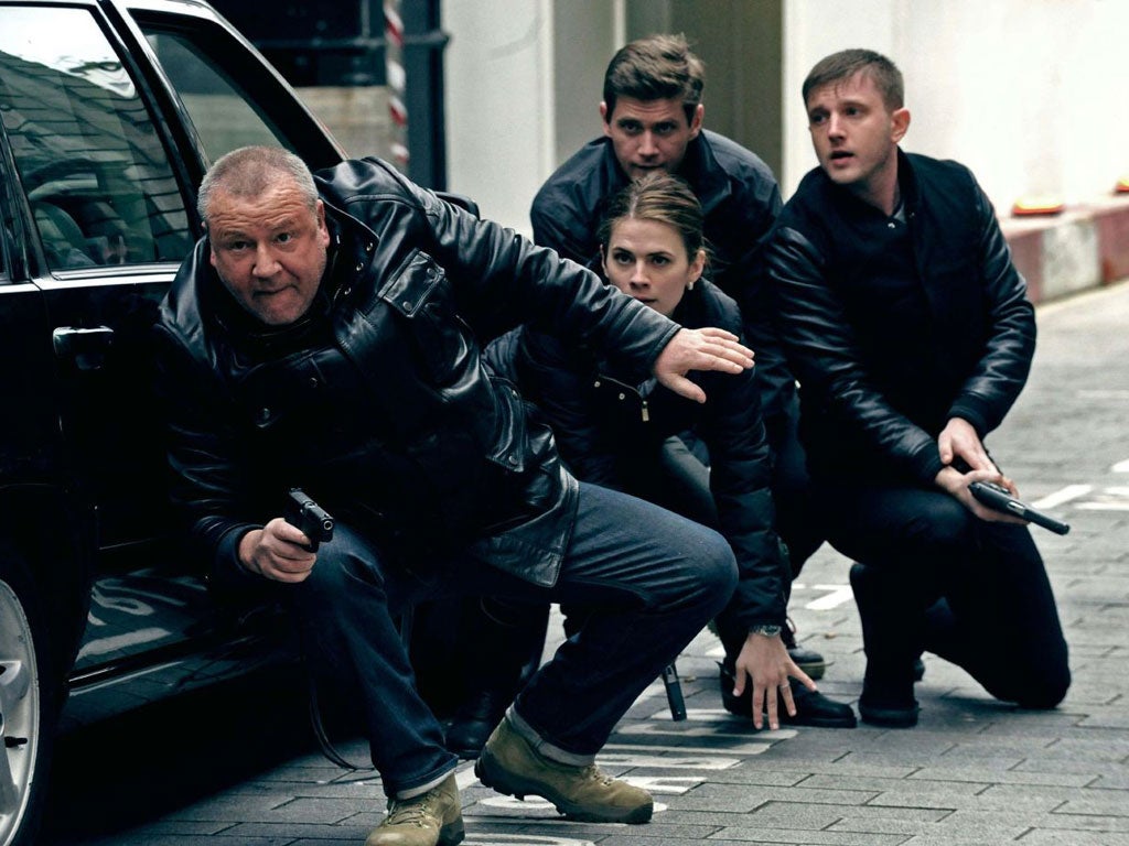 Modern times: Ray Winstone, far left, and Ben Drew, far right, take over as the tough London coppers