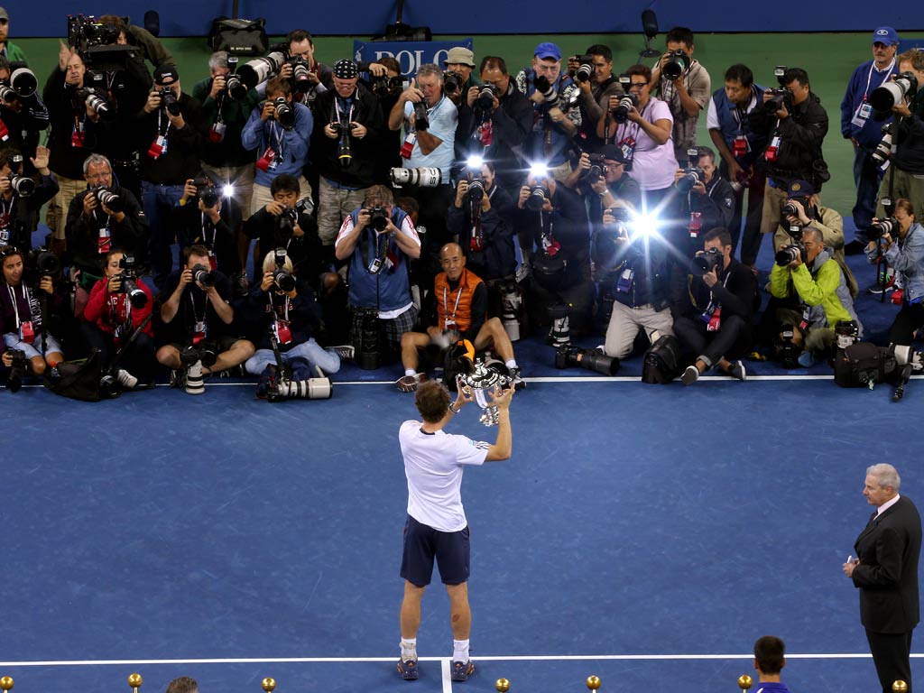 Andy Murray holds the US Open trophy aloft