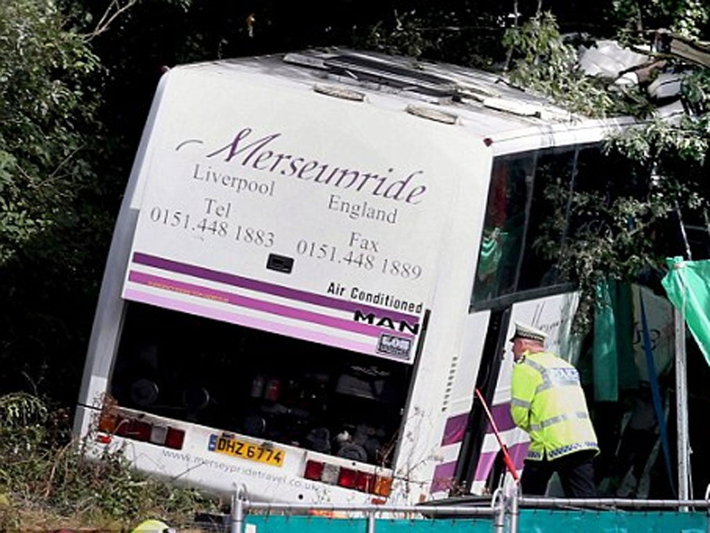 Surrey Police said the coach, which was travelling at full capacity, careered off the road and made ‘significant impact with a tree’.