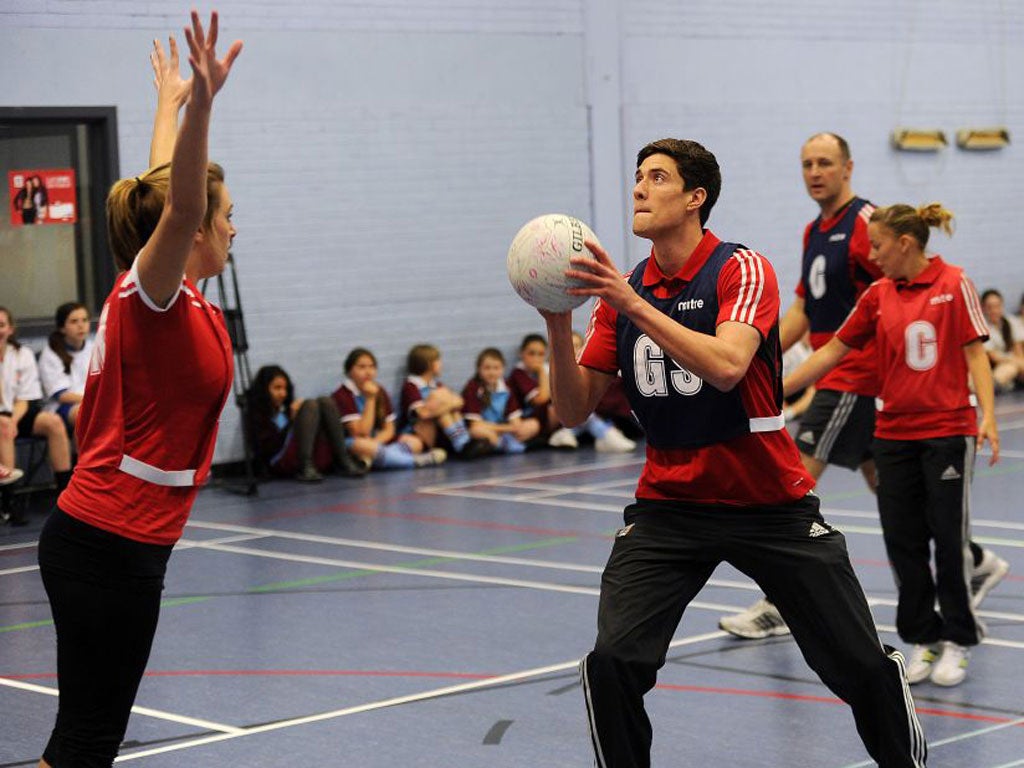 Liverpool’s Martin Kelly tries netball