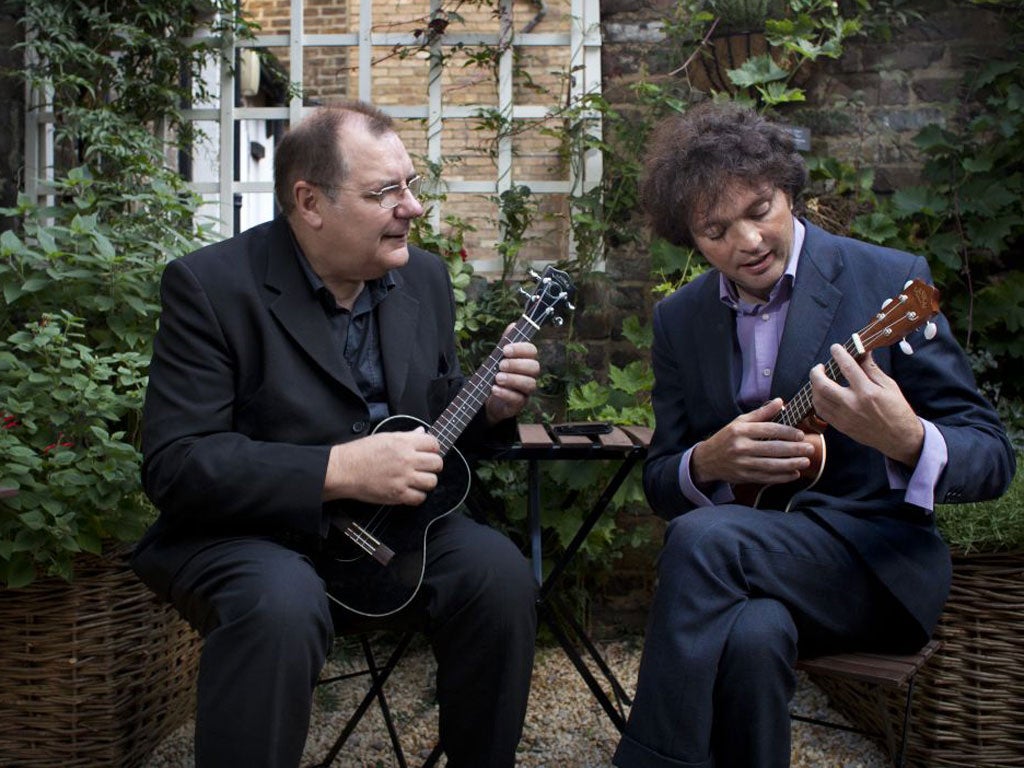 George Hinchliffe, left, gives Tom Hodgkinson a masterclass in the ukulele