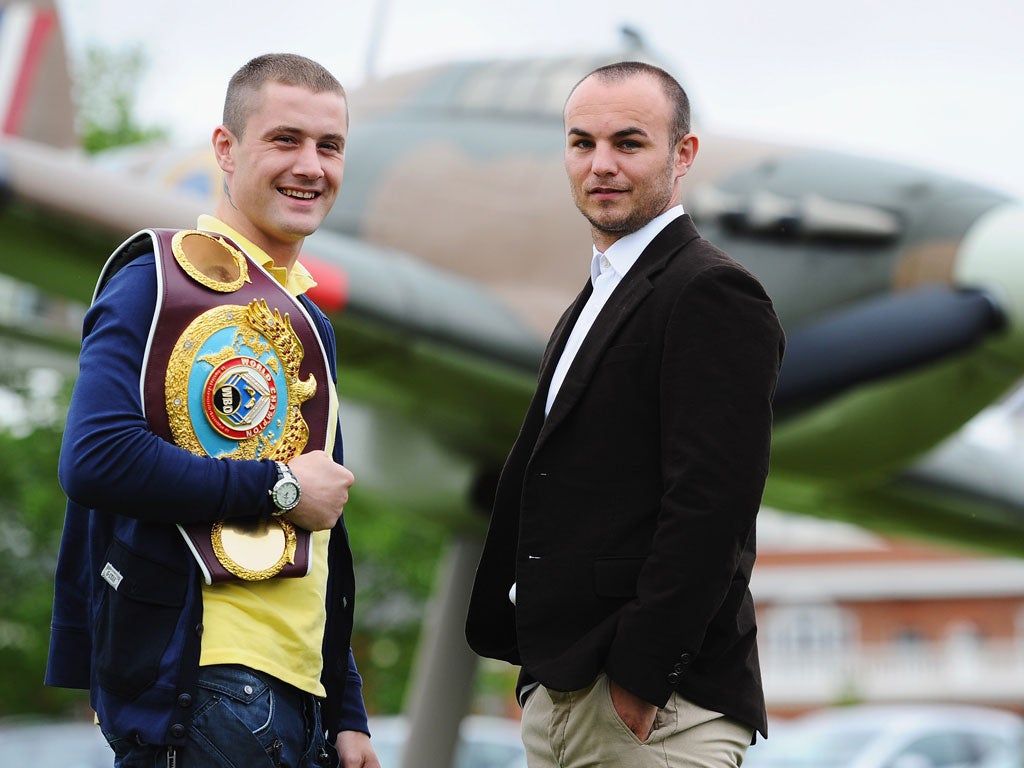 Mutual respect: Ricky Burns of Scotland (left) and challenger Kevin Mitchell of London ahead of Saturday's fight