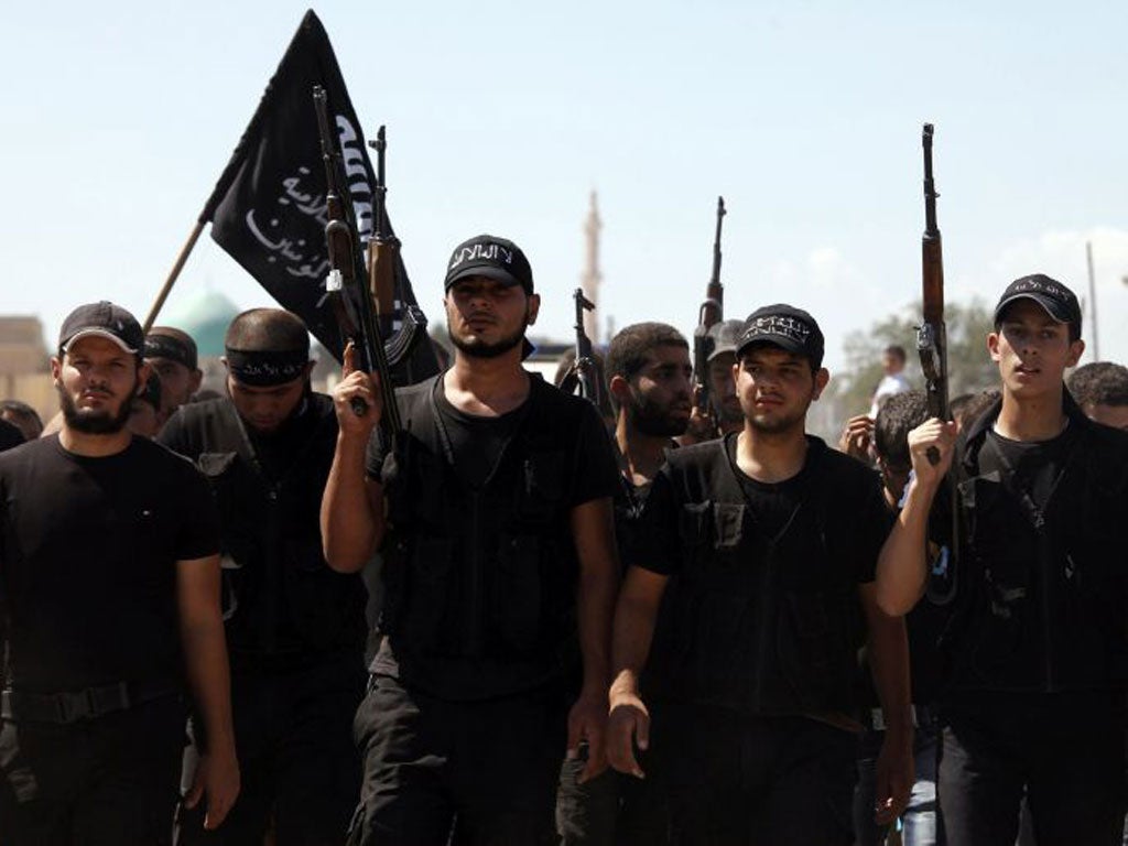 Islamist rebels during the funeral of fellow fighter Tareq Naser, who died during clashes on Sunday near Fafeen village in Aleppo