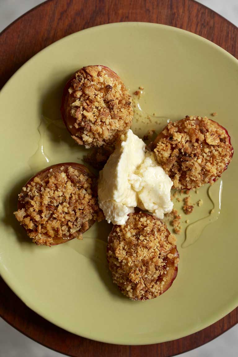 Baked Victoria plums with ricotta and honey