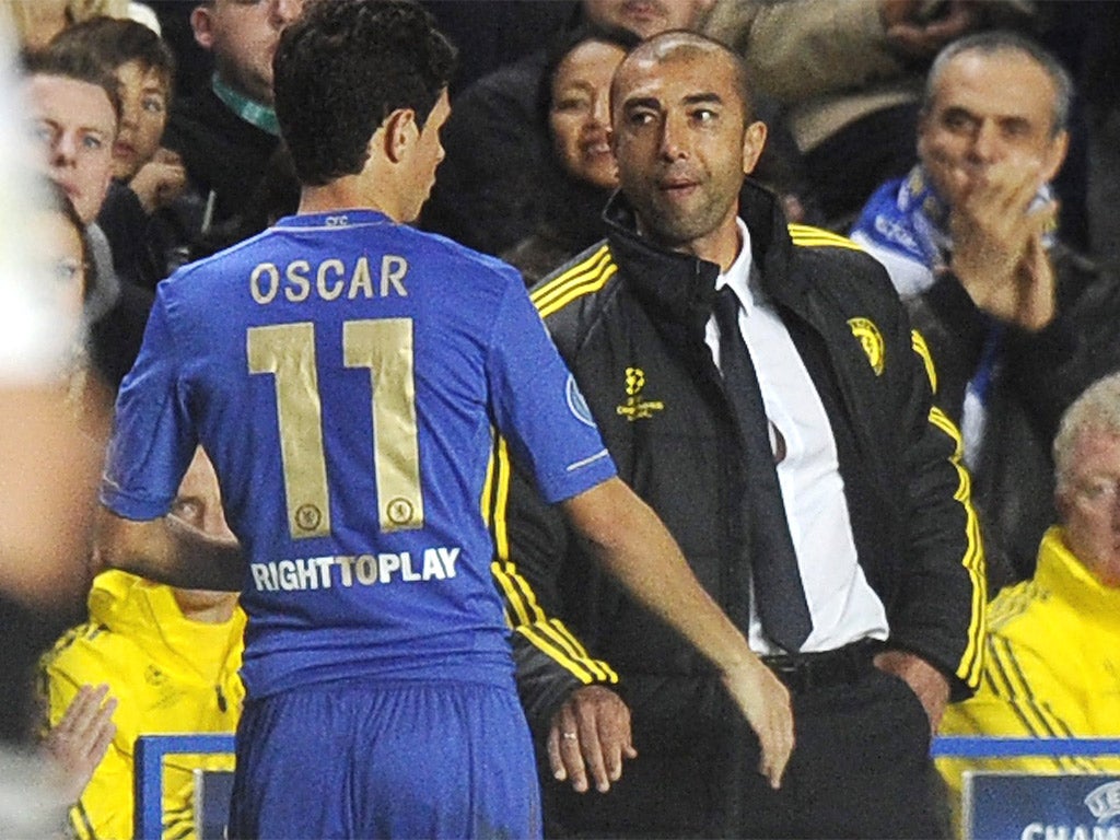 Roberto Di Matteo congratulates Oscar after the Brazilian’s two goals against Juventus last night