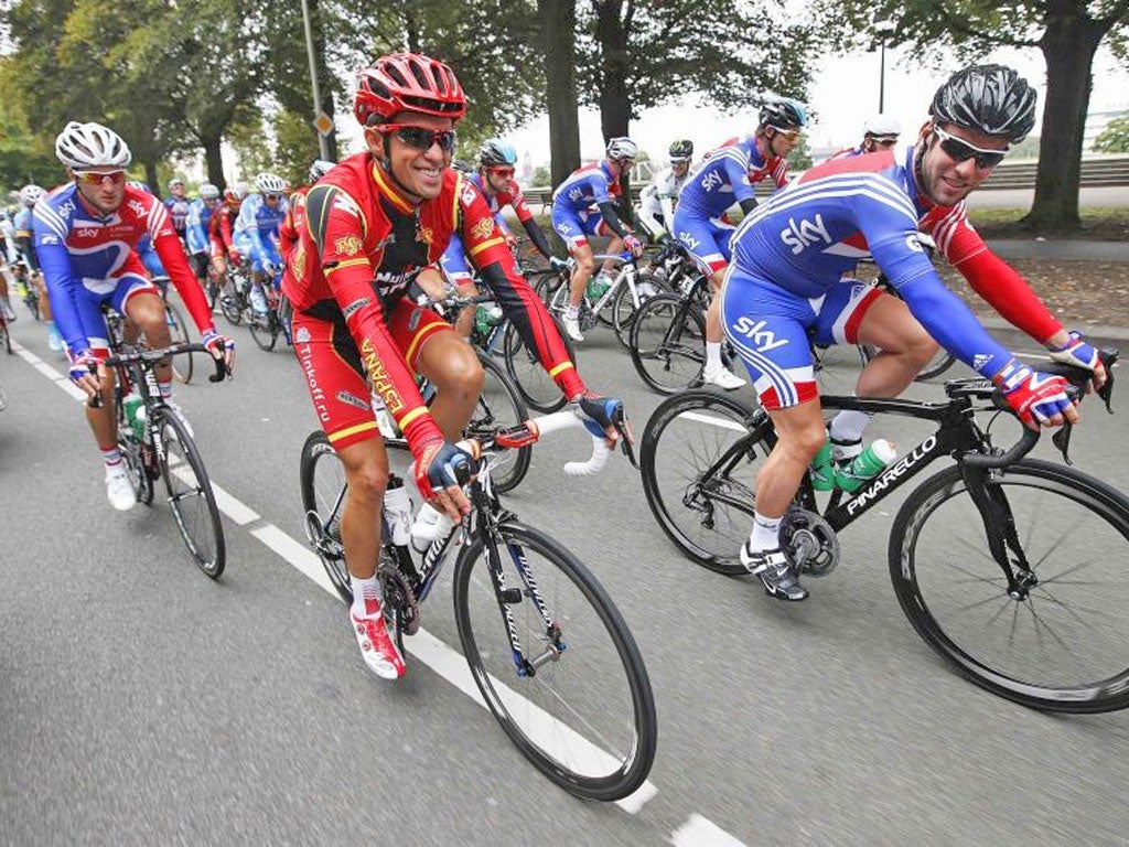 Bradley Wiggins, Alberto Contador and Mark Cavendish in action
yesterday