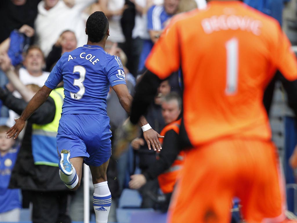 Ashley Cole celebrates his goal against Stoke