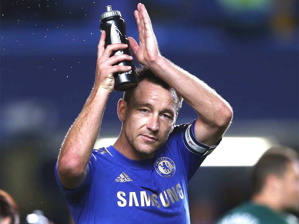 John Terry applauds the fans at Stamford Bridge last night