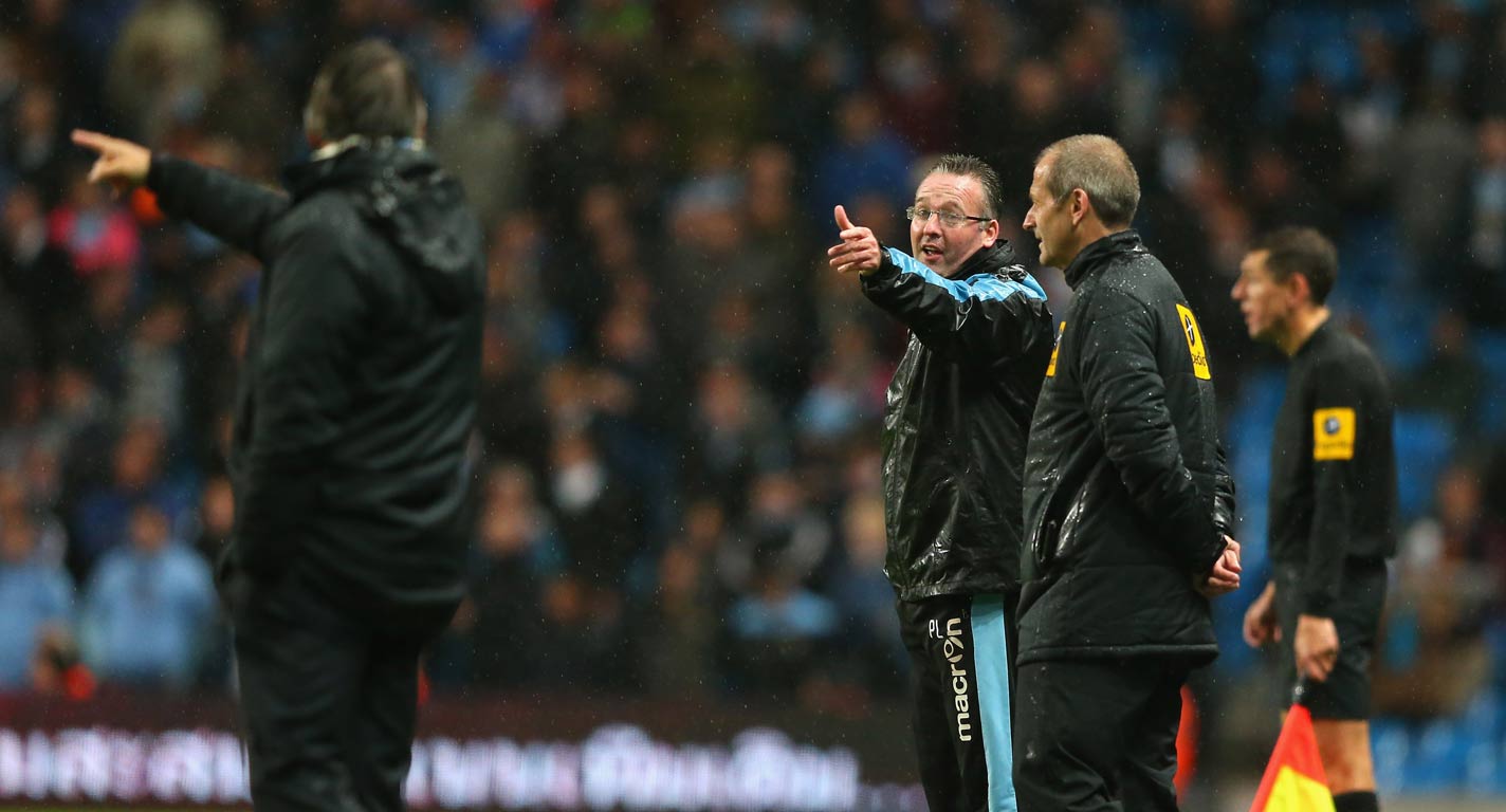 Roberto Mancini has words with Aston Villa manager Paul Lambert