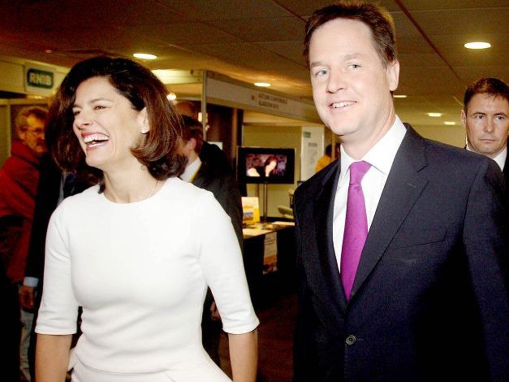 Nick Clegg and his wife MIriam arrive at the Brighton Conference Centre before his speech this afternoon