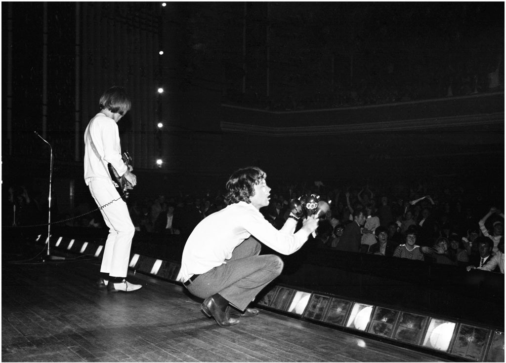Brian Jones and Mick Jagger performing at the Adelphi Theatre, Dublin, during the band's second Irish tour of 1965.