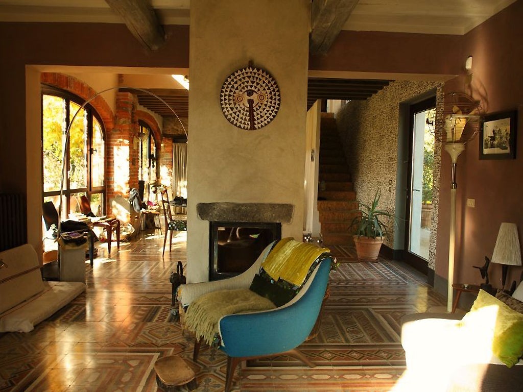 Stylish interiors at Il Fienile Boccagnano are complemented by a 20m pool