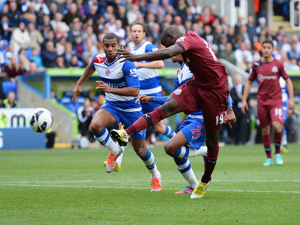 Demba Ba of Newcastle volleys in a spectacular equaliser