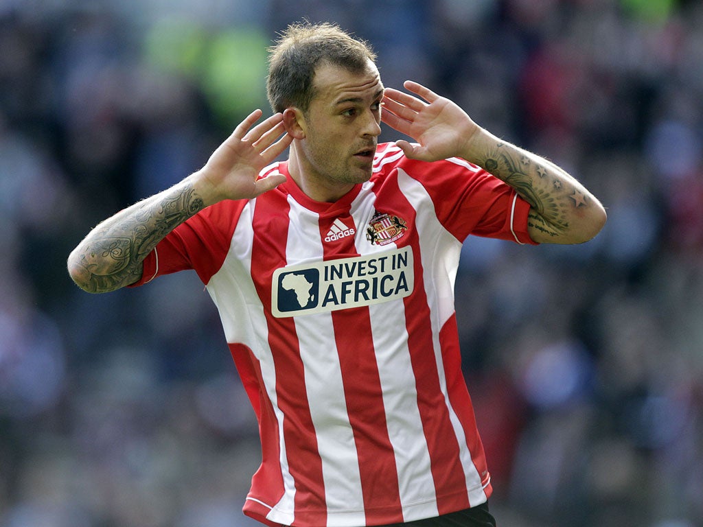 Steven Fletcher celebrates scoring the opening goal