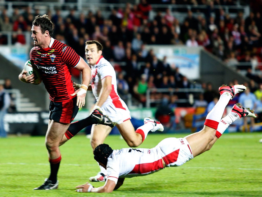 Pack leader: Trent Waterhouse scores during the Wolves’ win last night