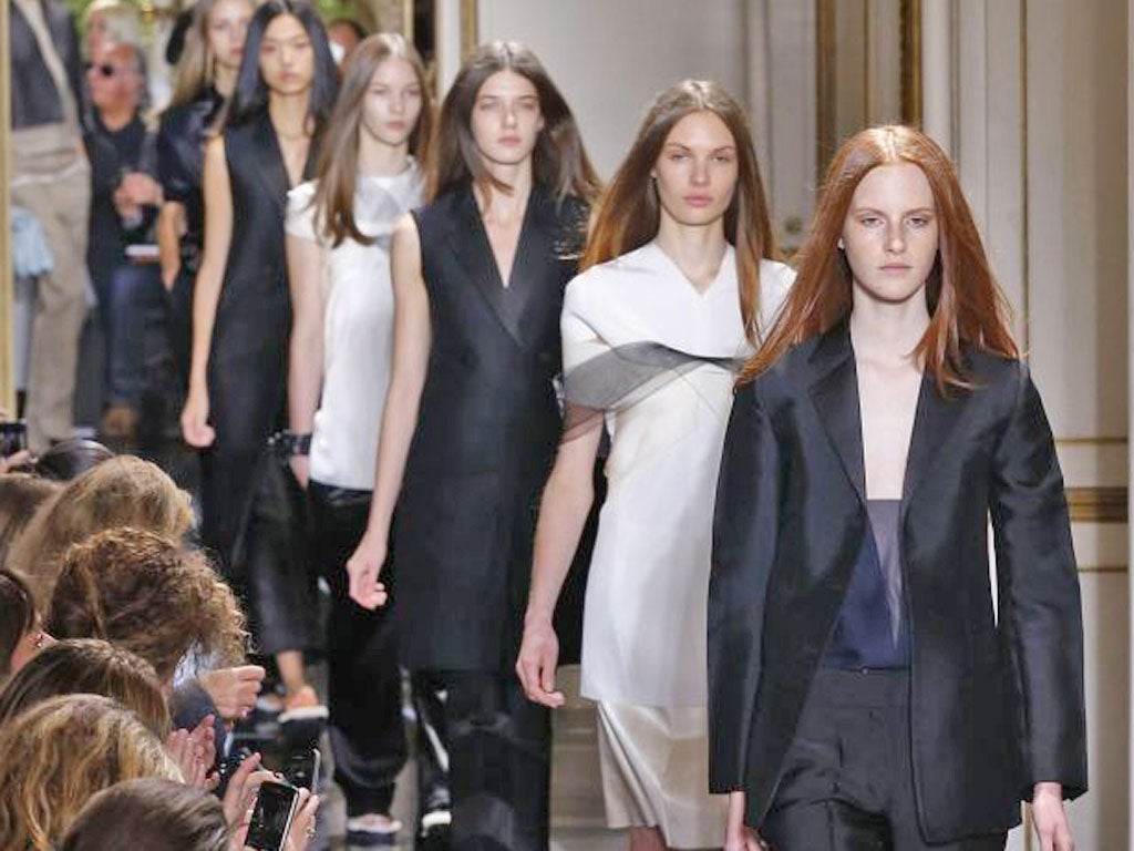 Models present creations by Celine during the Spring/Summer 2013 ready-to-wear collection show