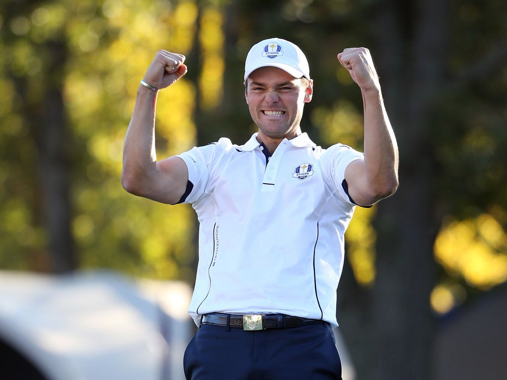 Martin Kaymer of Europe celebrates after holing the decisive putt on the 18th green