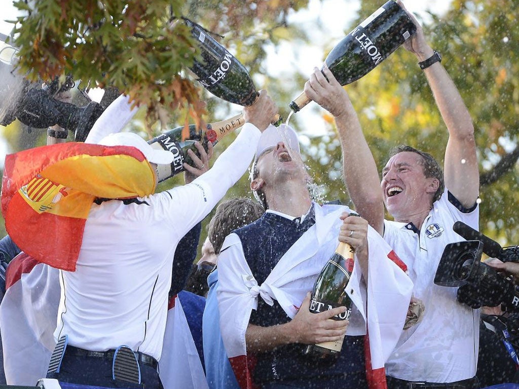 Justin Rose glugs the traditional post-game triple magnum of champagne