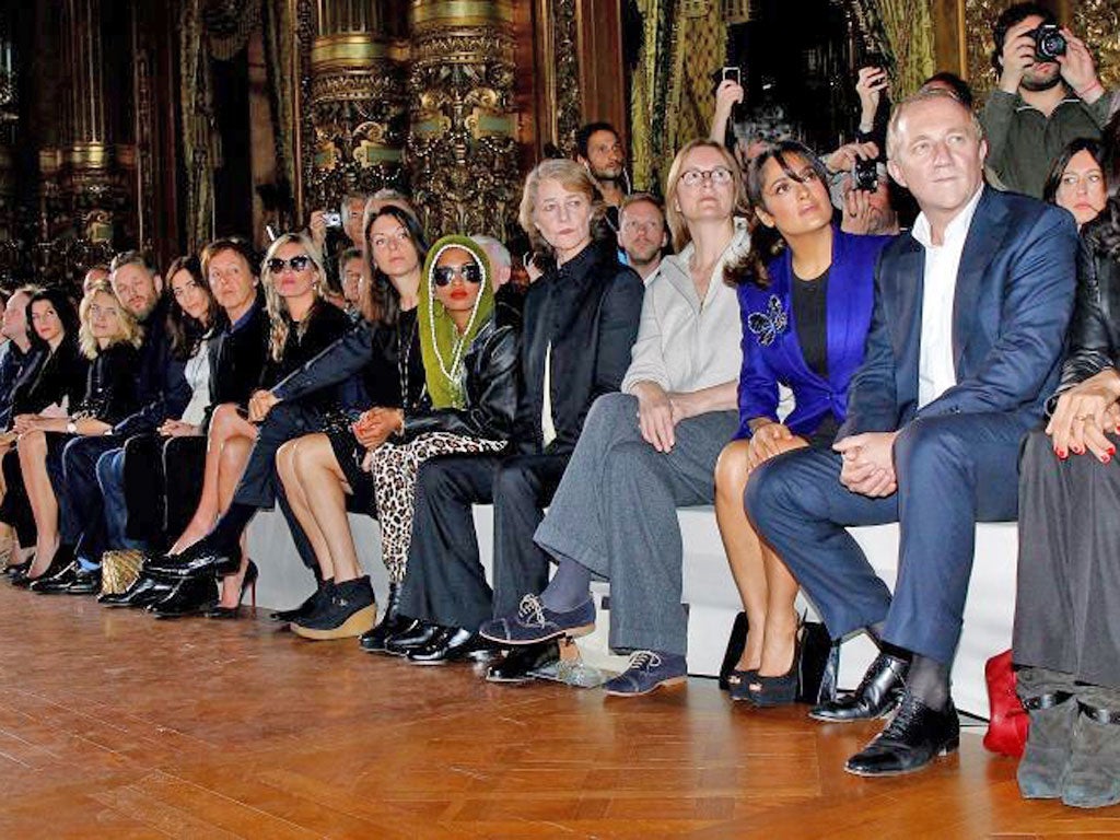 Front row of celebrities (from left): Nancy Shevell; Sir Paul McCartney; Kate Moss; Mario Testino; the rapper M.I.A; the
actress Charlotte Ramplin; the actress Salma Hayek; François-Henri Pinault, the chief executive of luxury goods firm PPR