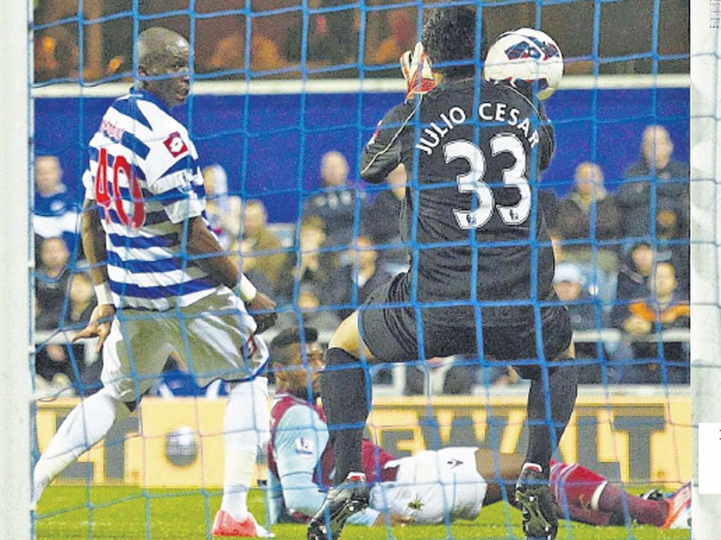 Ricardo Vaz Te beats Julio Cesar at the QPR goalkeeper’s near post