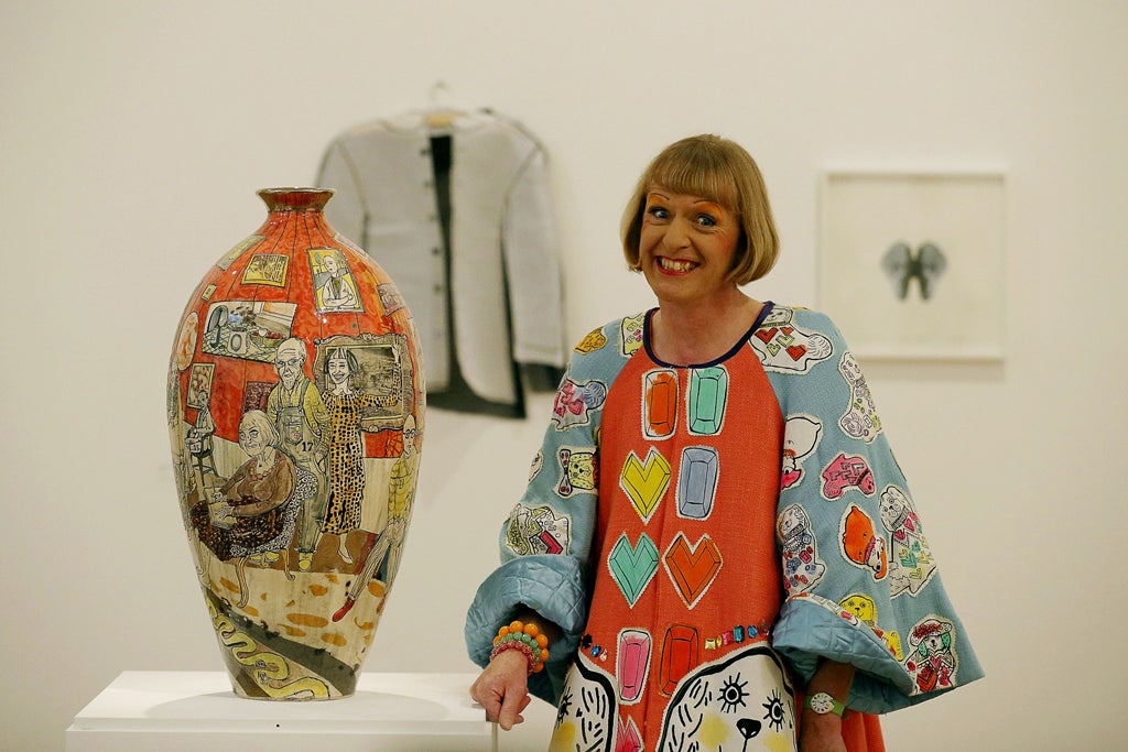 Artist Grayson Perry with "Bad Portraits of Establishment Figures" in the 'RA Now' exhibition