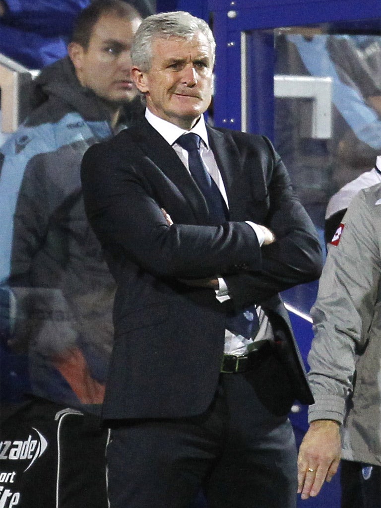 Mark Hughes watches QPR slip to another defeat against West Ham