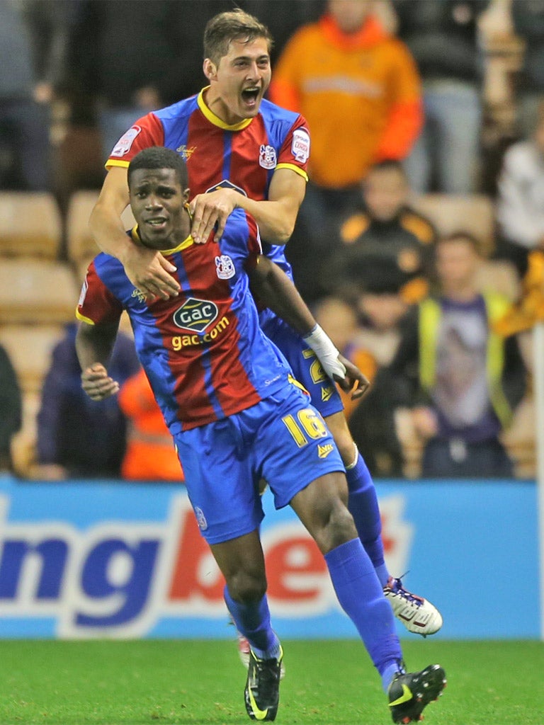 Wilfried Zaha celebrates his winner for Crystal Palace