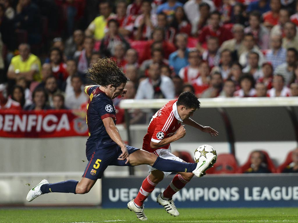 Carles Puyol fell awkwardly in the match with Benfica