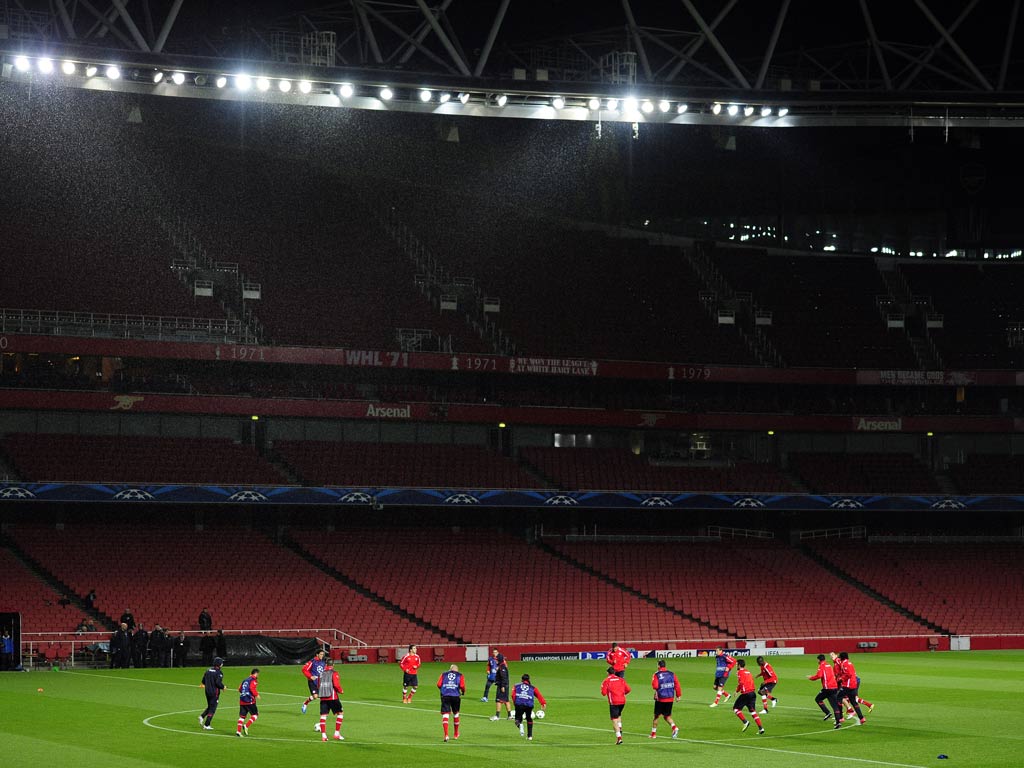 Olympiakos train at the Emirates stadium