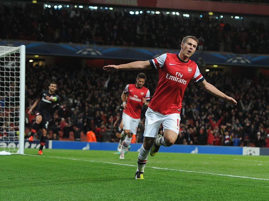 Aaron Ramsey celebrates his Champions League goal against Olympiakos