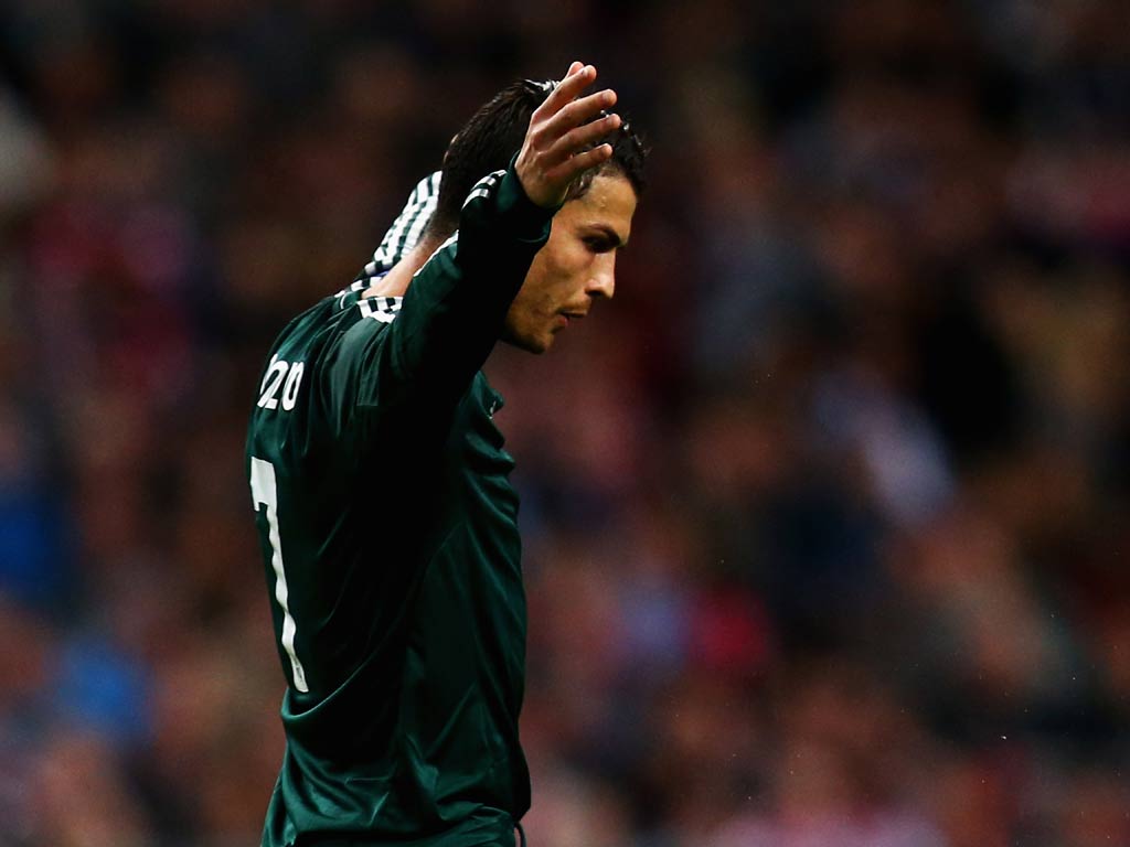 Cristiano Ronaldo celebrates his third