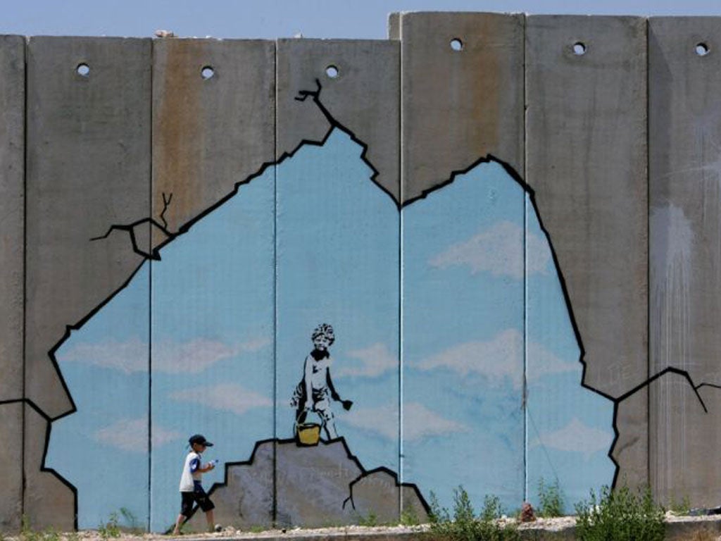 Epochal changes: barrier near Qalandiya checkpoint, on the West Bank