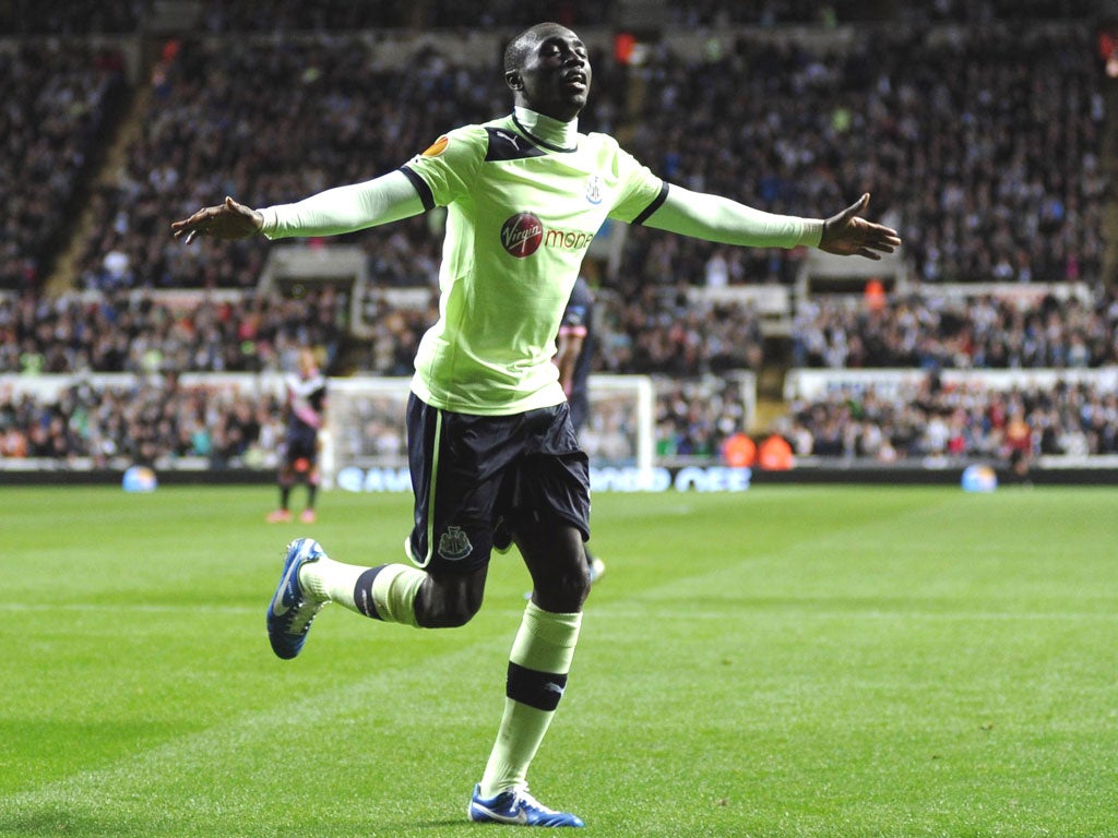 Cisse celebrates scoring the third goal of the game