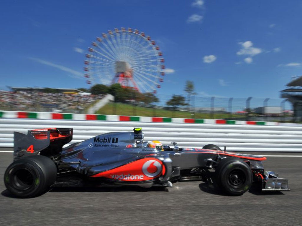 Lewis Hamilton takes part in the second practice session at Suzuka yesterday