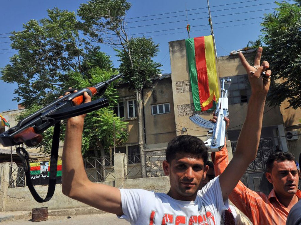 Syrian Kurds in the town of Jinderes, near Aleppo