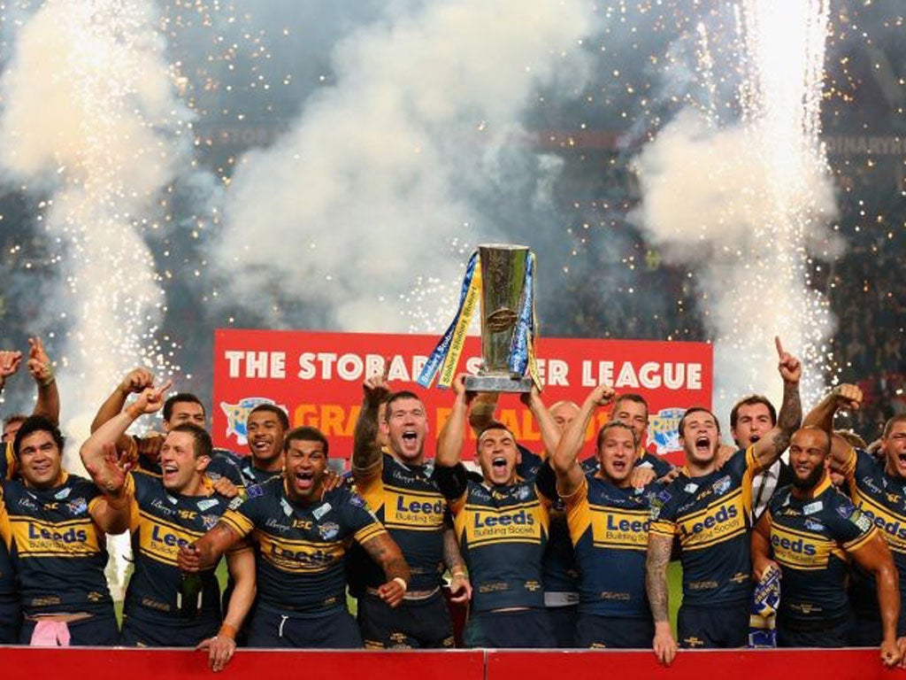 Captain Kevin Sinfield lifts the trophy after Leeds’ Grand Final win