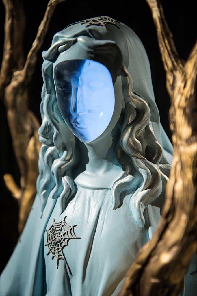 Tina Tsang's sculptures resemble Catholic idols but with television screens in their faces. They are Teletubbies meets Doctor Who.