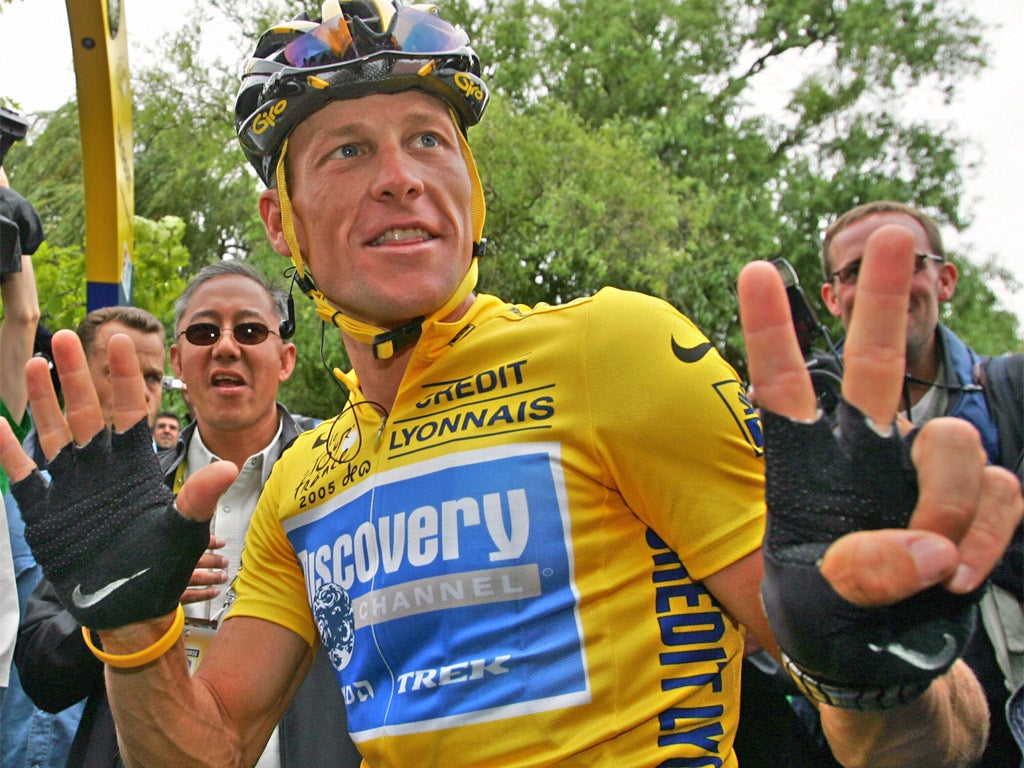 Lance Armstrong celebrates his seventh Tour de France win