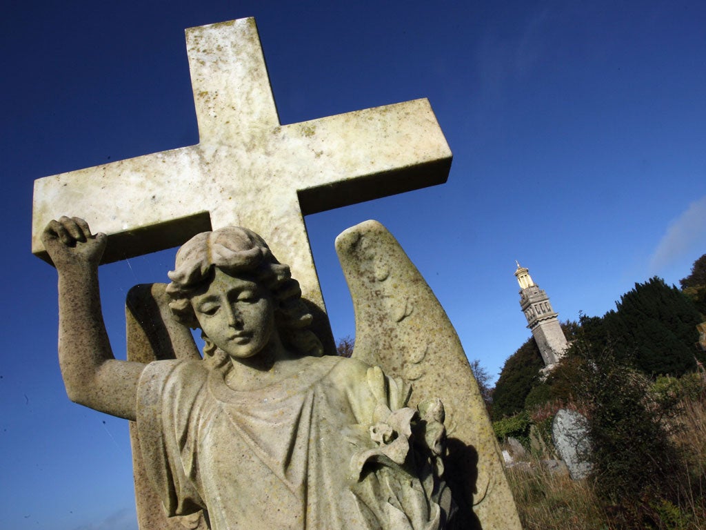 The sun illuminates gravestones in a cemetery near Bath on October 9 2008 in Somerset, England.