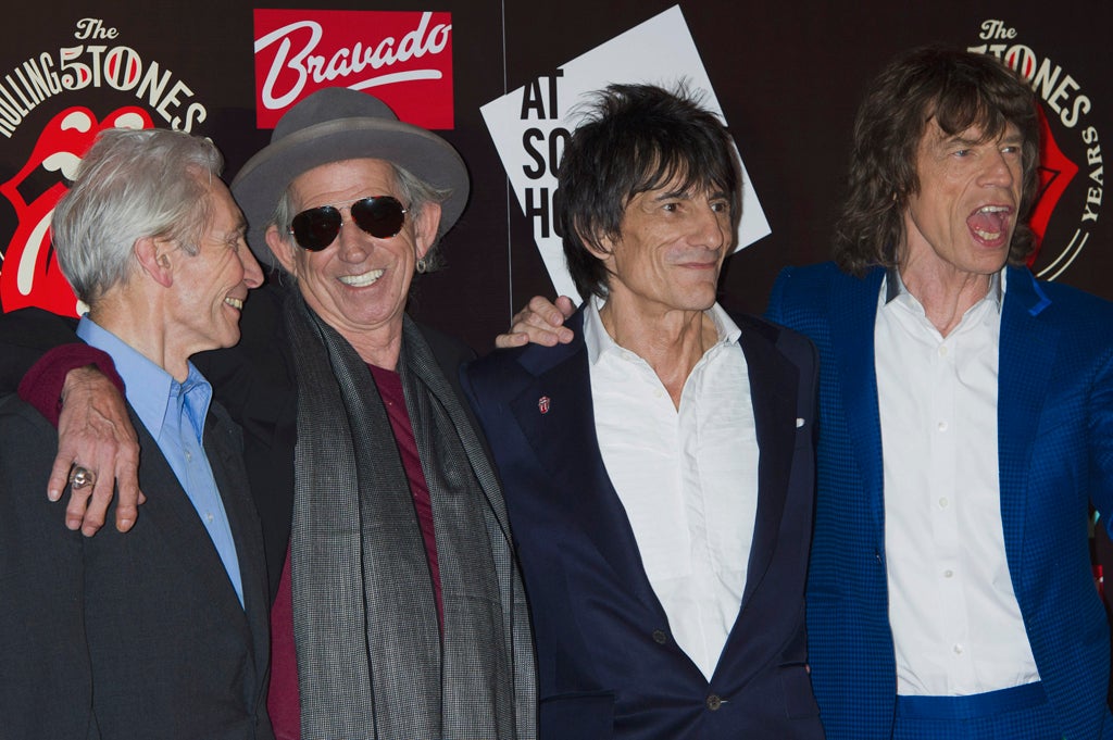 Charlie Watts, Keith Richards, Ronnie Wood and Mick Jagger, from the British Rock band, The Rolling Stones, as they arrive at a central London venue, to mark the 50th anniversary of the Rolling Stones first performance.