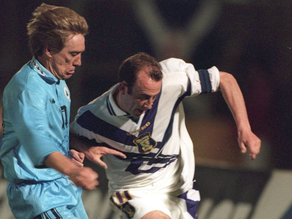 San Marino's Massimo Bonini (left) in action against Scotland